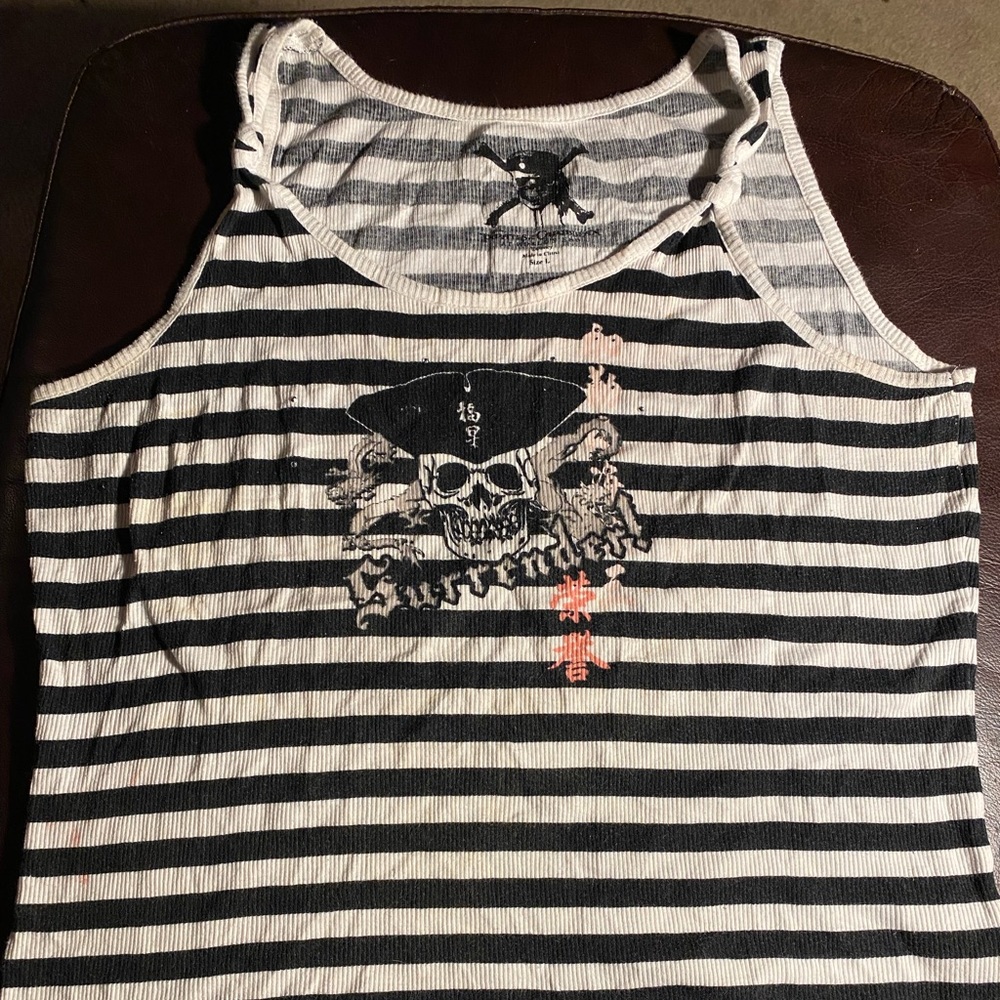 Pirates of the Caribbean- Disney Shirt Size large:wrinkled but will wash justask